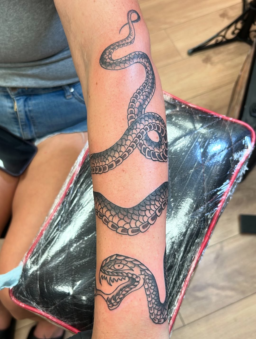 Late night snake tattoo